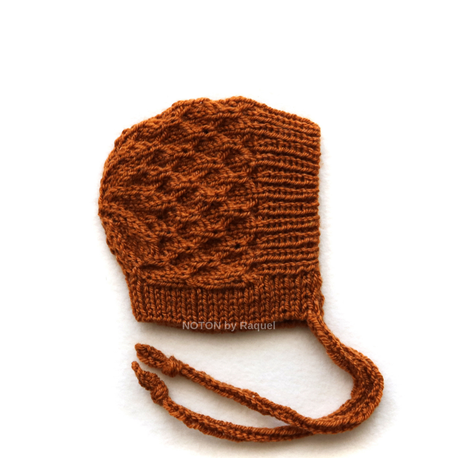 Touca de inverno para bebé em tricot artesanal na cor terra cota NOTON by Raquel KIDS